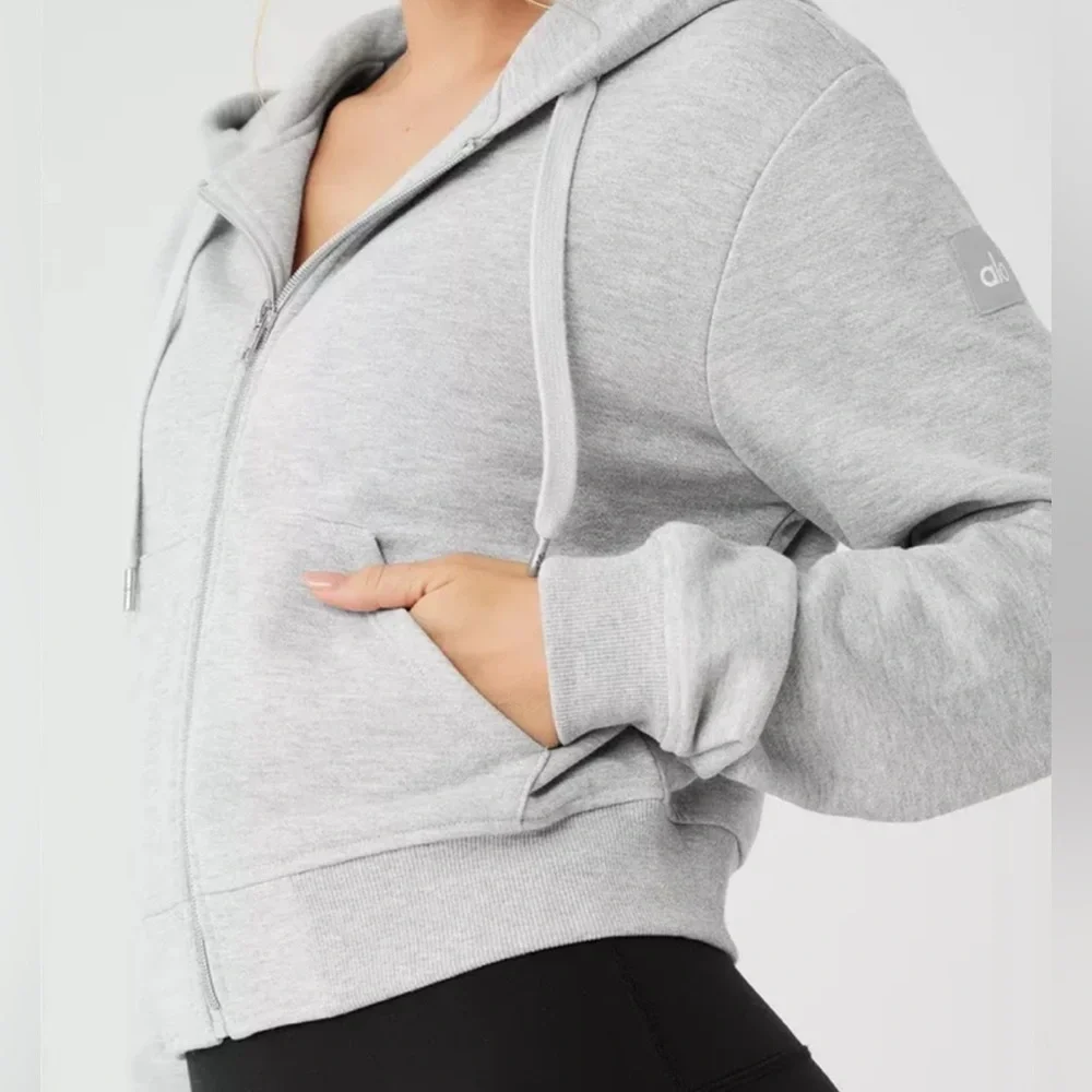 ALO Yoga Routine Cropped Zip Hoodie Jacket in Athletic Heather Grey - Picture 2 of 13